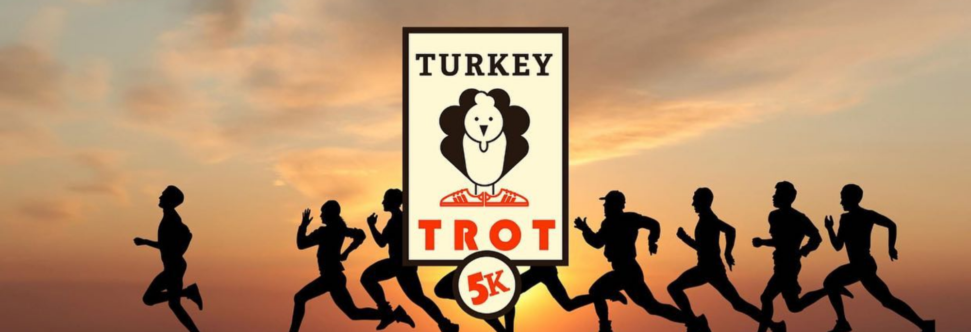 Image of runners with Turkey Trot event logo 